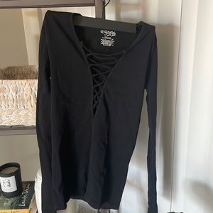Black long sleeve free people shirt with lace up middle